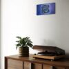 Celestial Facets of Sapphire - A realistic rectangular oil painting of a Sapphire diamond on wall